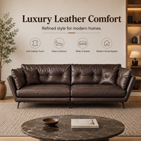 Canapé lounge en cuir capitonné marron avec coussins profonds et pieds en métal noir pour salon, hôtel, appartement