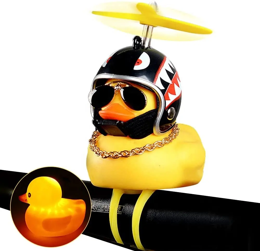 UMEDO-adornos de coche de pato de goma, adornos de coche de pato amarillo, decoraciones para tablero, exprimidor de pato, bocina de bicicleta con casco de hélice