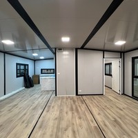 Casa Container Espandibile con Telaio Nero e Layout Interno Personalizzabile, Adatta per Vivere in Singolarità o in Comunità