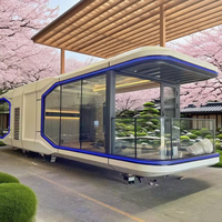 Design luxueux modulaire Capsule House tendance Mini dirigeable Pod cabine préfabriquée dosette de couchage pour hôtel boutique bureau