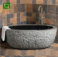 Baignoire autoportante décorative pour la maison, sculptée à la main en marbre noir et blanc naturel, pour adultes