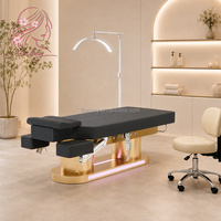 Lit de beauté électrique à 4 moteurs, base en acier inoxydable doré, lit de massage chauffant pour cils avec commande au pied