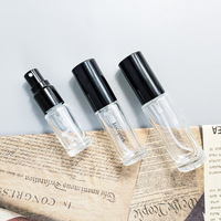 Atomiseur de parfum portable en verre rond de 5 ml et 10 ml avec base robuste et pompe à brume en aluminium pour échantillons de parfum