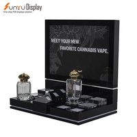 Comptoir de magasin de maquillage cosmétique en acrylique de luxe Cabinet de parfum Led Présentoir de parfum noir à 3 niveaux