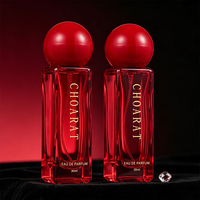 Vente en gros d'usine, flacon de parfum en verre transparent rectangulaire carré rouge élégant haut de gamme de 30 ml avec bouchon sphérique et impression sérigraphiée
