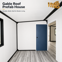 Maison conteneur ondulée à cadre noir de 20 pieds, 2 chambres, salle de bain complète, fenêtres coulissantes extensibles à double aile, moderne, ISO 9001 CE