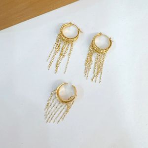 Pendientes de Aro Xinfly Au750 para Mujer, Diseño de Alta Gama, Lujosos, con Borla en Forma de U y Clip para la Oreja, Ideales para Fiestas - Product Image 1