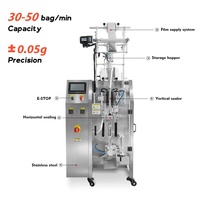 Machine d'emballage verticale automatique CE à prix d'usine pour le remplissage de liquides en sachets, idéale pour les jus, les barres de fruits, les gelées et les bâtonnets.