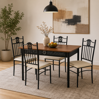 Table à manger rectangulaire avec 4 chaises rembourrées, cadre en métal noir ajouré et sculpté pour cuisine et salle à manger