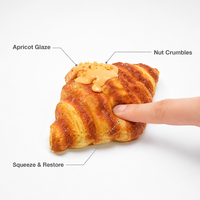 Jouet Squishy Croissant avec design brillant, morceaux de noix croquants et motif salé, anti-stress, se repulpe après pressage, décoration de bureau