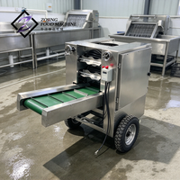Machine à peler les jeunes noix de coco automatique et commerciale avec entraînement par chaîne de 1,5 kW pour usine de jus de coco