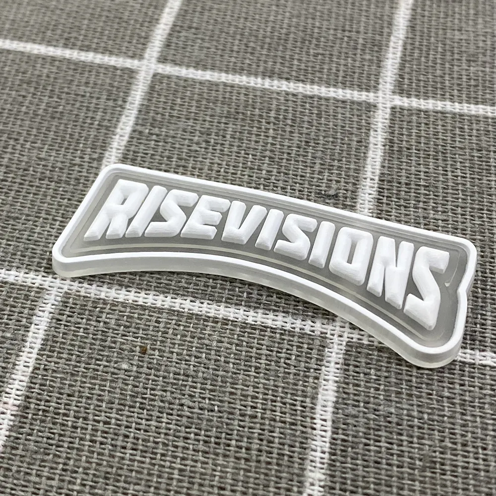 Jacket Custom Embossed Iron On Soft Rubber PVC Garment Label Rubber Patch Clothing Clothes Rubber Logo 3d Silicone PVC Logo