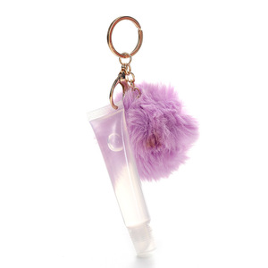 Vendita calda Clear Lip Oil Gloss simpatici bambini idratante lucidalabbra con Macaron Puff Ball Keychain Makeup - Product Image 4