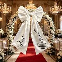 Grande arche florale de mariage en satin blanc de luxe avec nœud décoratif pour la cérémonie de mariage, la fête et la décoration de fond