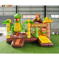 Château gonflable sur le thème des dinosaures avec toboggan pour la location