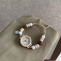 Montre à quartz pour femme NYY avec cordon tressé à perles étoiles mignonnes, cordon de serrage réglable, design écologique en cristal acrylique