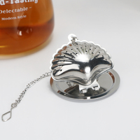 Infuseur à thé en acier inoxydable au design moderne Offre Spéciale Forme de coquille de haute qualité avec chaîne 5.2cm de diamètre Logo personnalisé Service à café et thé