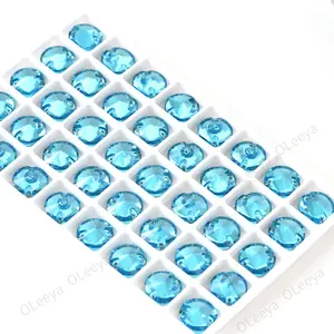 Oleeya Hot Sale Top Quality 5A Bevel Glass Flatback 12mm Volcano Round Rivoli Sew On Rhinestones With Two Holes For Clothing