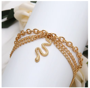 Bracelet <span class=keywords><strong>de</strong></span> <span class=keywords><strong>cheville</strong></span> chic plaqué <span class=keywords><strong>or</strong></span> <span class=keywords><strong>jaune</strong></span> à trois rangs, chaîne serpent, pendentif croix, détail pompon - Product Image 2