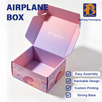Boîte d'expédition pliable en carton personnalisée pour vêtements, avec fermeture auto-adhésive, pour l'expédition de vêtements et de tenues.