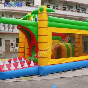 Parc d'attractions gonflable multifonctionnel personnalisé en PVC, thème dinosaures tropicaux, avec parcours d'obstacles et toboggan, facile à monter - Product Image 3