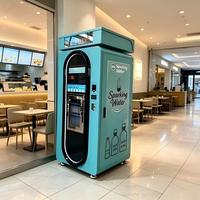 Machine à eau gazeuse en libre-service 24h/24, acceptant les pièces de monnaie, les billets de banque, les cartes à puce et les codes QR.