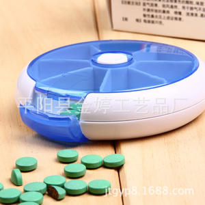 Pilulier rond portable avec 6 compartiments, boîte rotative en plastique ABS/PP - Product Image 1