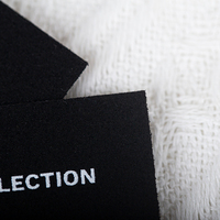 Étiquette tissée pour vêtements en microfibre personnalisée Étiquettes de marque privée pour col de vêtement