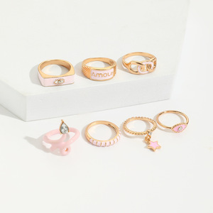 Set di 7 Anelli Rosa con Effetto Goccia d'Olio per Donne, Set di Anelli con Motivi Serpente, Stella e Occhio, Accessori per Feste - Product Image 3