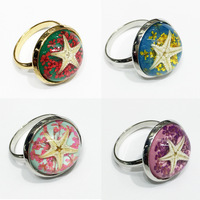 Bague ajustable en résine étoile de mer et fleur naturelle, style océan, avec coquille d'ambre, pour femme, idéale pour les fêtes estivales à la plage – Nouveauté très prisée