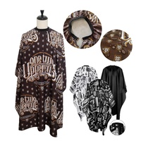 Nouvelle arrivée Cape de barbier de salon de beauté de haute qualité avec des motifs provenant directement du fabricant Cape de coupe de cheveux avec logo