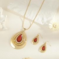 Parure de bijoux plaqué or pour femme, collier long tendance avec pendentif goutte rouge et boucles d'oreilles chaîne serpent, vente en gros personnalisée