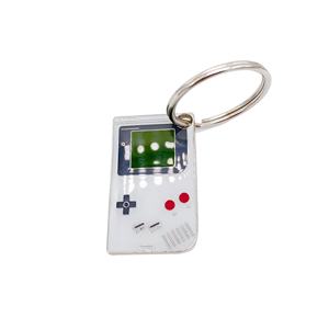 ขายส่งพวงกุญแจโลหะเคลือบอ่อนรูปเครื่องเล่นเกมการ์ตูน 2 มิติ 3 มิติ แบบเปล่า พร้อมโลโก้สั่งทำได้ - Product Image 6