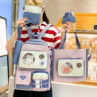 Tas Ransel Kanvas Grosir Desain Baru Wanita Kapasitas Besar 5-in-1 Set Siswi Lucu Boneka Plush Tas Ransel Dompet