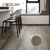 Revêtement de sol en plastique SPC effet bois flottant noir de luxe de 6mm Carreaux de PVC imperméables en vinyle chêne clic pour une utilisation en intérieur dans les supermarchés