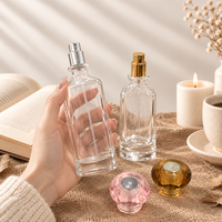 Flacon de parfum en verre transparent à fond épais de 50 ml et 100 ml, flacon vide en forme de cylindre, flacon vaporisateur de parfum avec pulvérisateur argenté ou doré