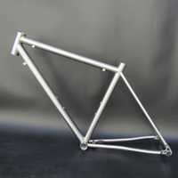 Cadre de vélo en titane GR9 usiné sur mesure par CNC pour route/VTT/gravel, tubes coupés à chaud ultra-légers, haute stabilité et performance.