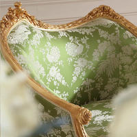 Fauteuil de salon de style européen avec structure en bois massif et rembourrage en tissu et éponge pour villas, salles à manger et salons