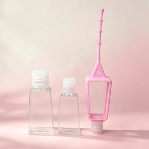 ขวดพลาสติกใสเปล่าสำหรับใส่เจลแอลกอฮอล์แบบขายส่ง พร้อมสายคล้องซิลิโคน ขวดบีบแบบพกพาสำหรับเดินทาง ใช้ซ้ำได้ - Product Image 1