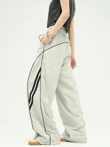 Streetwear thương hiệu tùy chỉnh ghi âm trackpants Polyester giải trí quá khổ thẳng người đàn ông tùy chỉnh bên sọc chạy Bộ Tracksuit chạy bộ