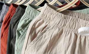 Pantalones cortos de lino informales de verano de cintura media para hombre transpirables 100% poliéster pantalones cortos de playa teñidos lisos suaves y elegantes - Product Image 4