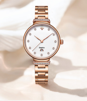 Montre à quartz pour femme, personnalisable avec logo, design moderne et luxueux, bracelet en acier inoxydable, verre, lunette sertie de diamants, aiguilles en forme de feuille, date, papillon