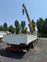 Grue montée sur camion Sinotruk Howo TX460 6x4 ; Grue télescopique SQS300 de 12 tonnes pour le transport de marchandises.