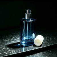 Flacon de parfum en verre cylindrique de 100 ml avec atomiseur argenté, flacon en verre vide pour eau de parfum, huile de parfum, service d'impression personnalisée