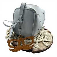 Nouveau support créatif en cuir PU pour lunettes de soleil, organisateur de lunettes, breloque de sac à lunettes pour homme élégant