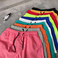 Vente en gros de fabricant de maillots de bain personnalisés Shorts avec cordons Pantalons de sport de plage d'été vierges Jogger Gym Shorts en nylon pour hommes