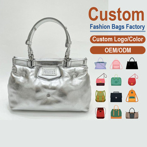 กระเป๋าสะพายหนังแท้แบบฟูลเกรน – ดีไซน์เคลือบเงาอย่างดี พร้อมรูปทรงโค้งมนและนุ่มนวล - Product Image 1