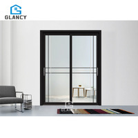 Portes coulissantes en verre en alliage d'aluminium Manuelles Résistantes à l'eau Anti-ouragan pour l'intérieur de la cuisine et l'utilisation en jardin dans les maisons Villas