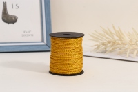 Cordon en polypropylène tressé 8 brins, fil doré 4 mm sur bobine noire, idéal pour emballages cadeaux et cordons de vêtements