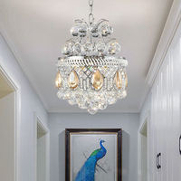 Lustre en cristal argenté classique brillant au design créatif, lampe suspendue moderne pour salon et chambre à coucher